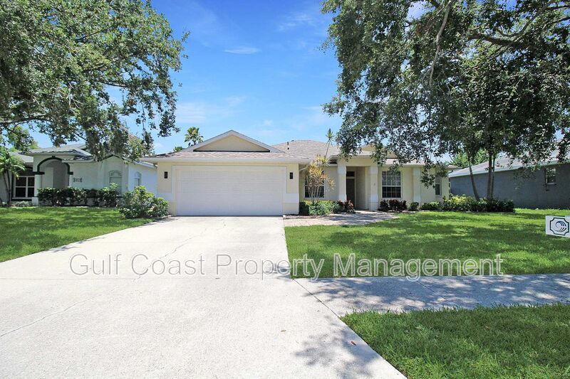 Annual rental: Spacious 3BR/2BA Creekwood Home with Office, Screened Lanai, EV Charger & Resort-Style Amenities property image