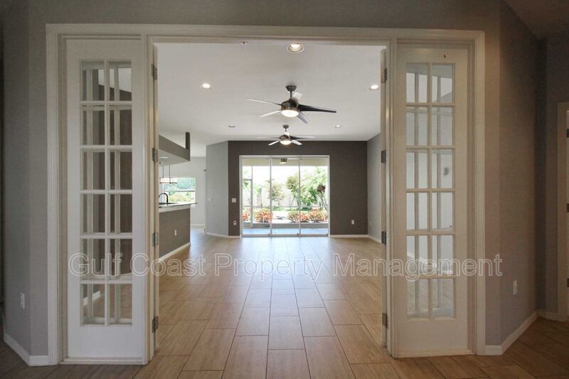 Annual rental: Spacious 3BR/2BA Creekwood Home with Office, Screened Lanai, EV Charger & Resort-Style Amenities property image