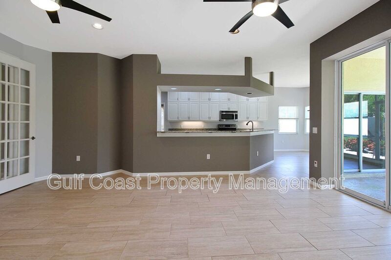 Annual rental: Spacious 3BR/2BA Creekwood Home with Office, Screened Lanai, EV Charger & Resort-Style Amenities property image