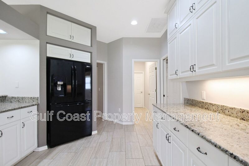 Annual rental: Spacious 3BR/2BA Creekwood Home with Office, Screened Lanai, EV Charger & Resort-Style Amenities property image