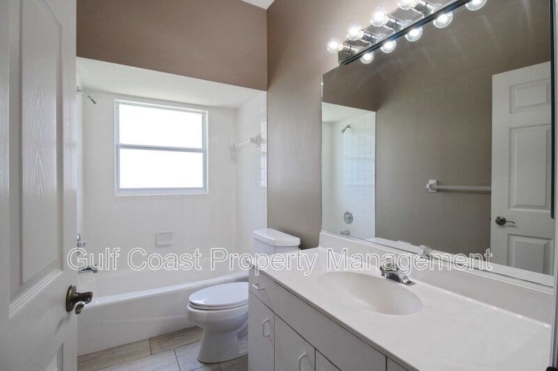 Annual rental: Spacious 3BR/2BA Creekwood Home with Office, Screened Lanai, EV Charger & Resort-Style Amenities property image