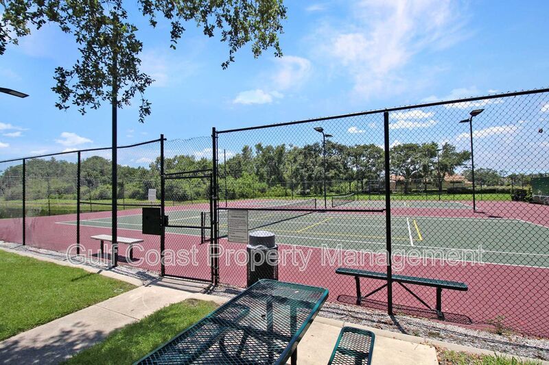 Annual rental: Spacious 3BR/2BA Creekwood Home with Office, Screened Lanai, EV Charger & Resort-Style Amenities property image