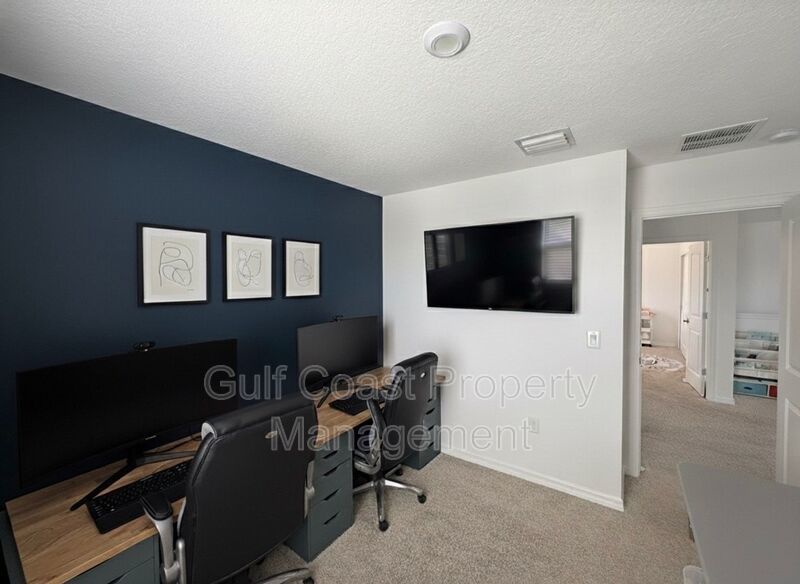 Annual unfurnished Rental, 4-Bedroom Home with Pond Views and Custom Putting Green in Artisan Lakes/Eaves-Available December 1st property image