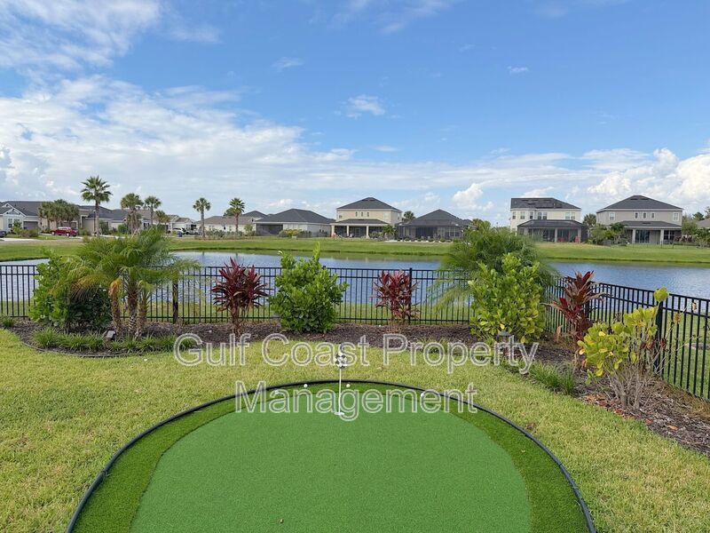 Annual unfurnished Rental, 4-Bedroom Home with Pond Views and Custom Putting Green in Artisan Lakes/Eaves-Available December 1st property image