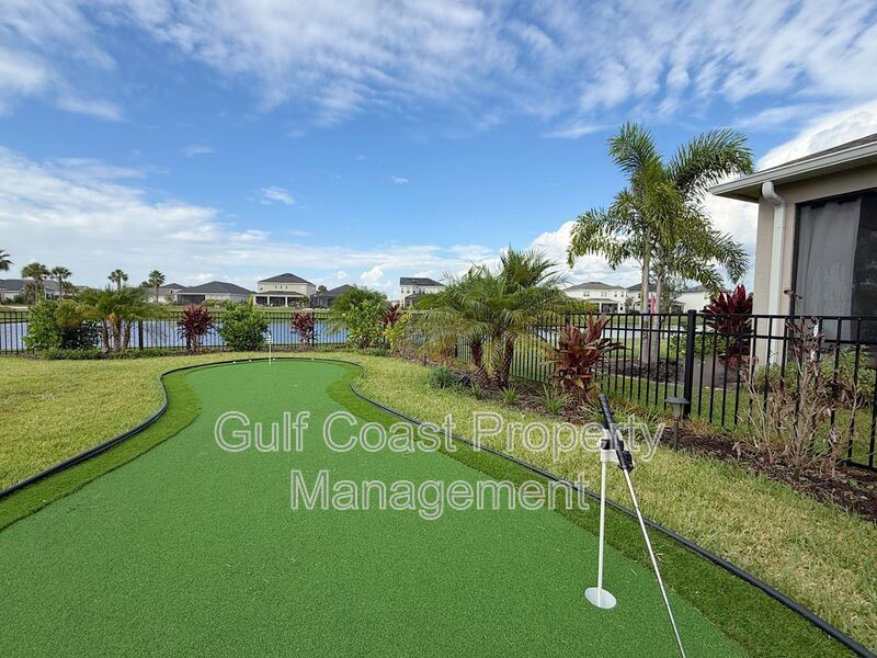 Annual unfurnished Rental, 4-Bedroom Home with Pond Views and Custom Putting Green in Artisan Lakes/Eaves-Available December 1st property image