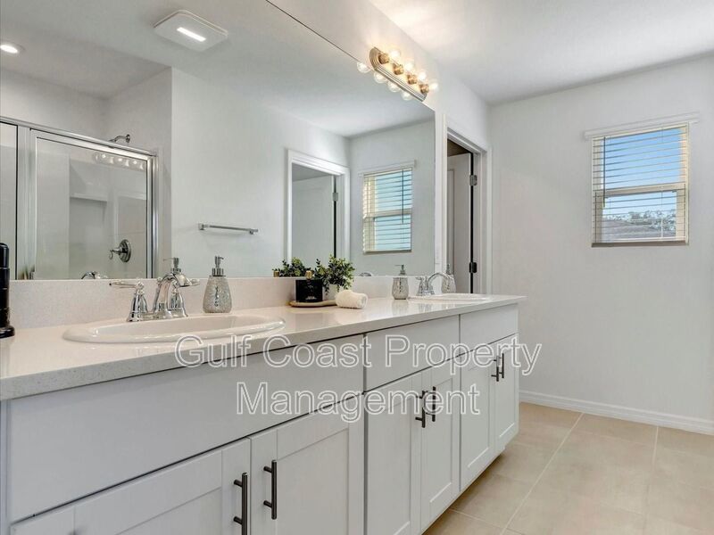 Annual unfurnished Rental, 4-Bedroom Home with Pond Views and Custom Putting Green in Artisan Lakes/Eaves-Available December 1st property image