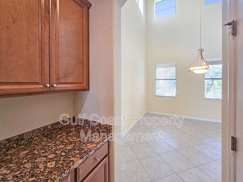 Resort-Style 4-Bedroom, 3full-Baths and 2-Half Baths Waterfront Pool Home in the Gated Community of River Strand property image