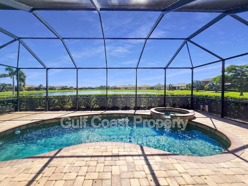 Resort-Style 4-Bedroom, 3full-Baths and 2-Half Baths Waterfront Pool Home in the Gated Community of River Strand property image