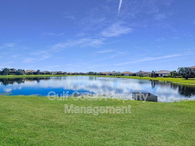 Resort-Style 4-Bedroom, 3full-Baths and 2-Half Baths Waterfront Pool Home in the Gated Community of River Strand property image