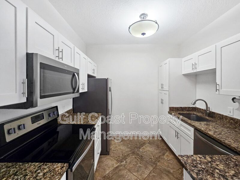 Gated Community Living with FREE Garage! Updated 2BR/2BA Condo in The Palms of Cortez property image