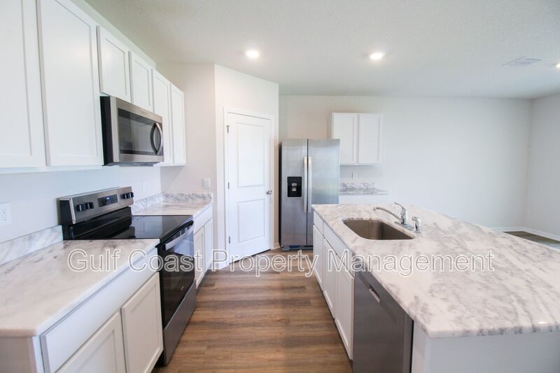 Annual Lakeview Retreat in Gated Solera – 4BR Home with Fenced Yard & Lake View property image