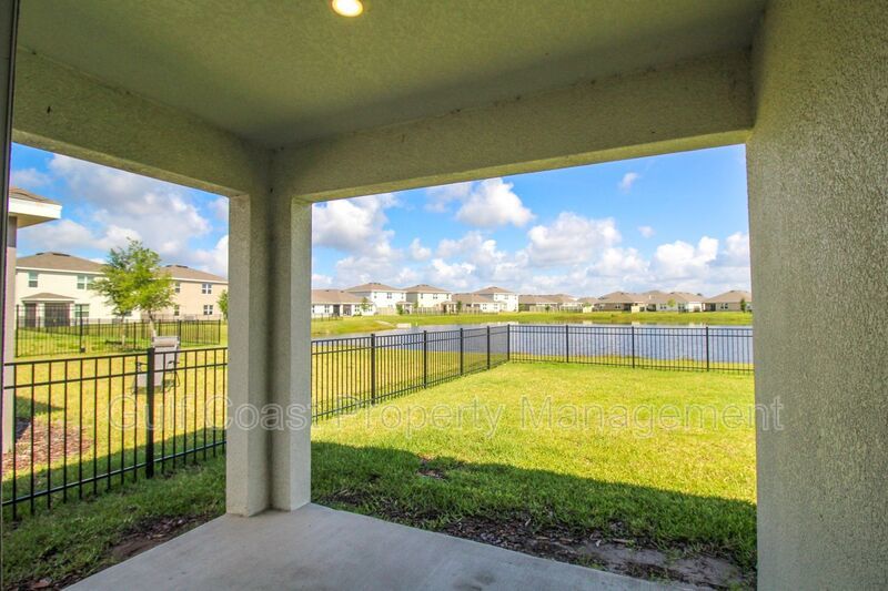Annual Lakeview Retreat in Gated Solera – 4BR Home with Fenced Yard & Lake View property image
