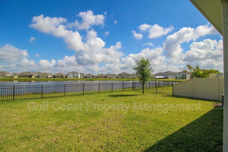 Annual Lakeview Retreat in Gated Solera – 4BR Home with Fenced Yard & Lake View property image