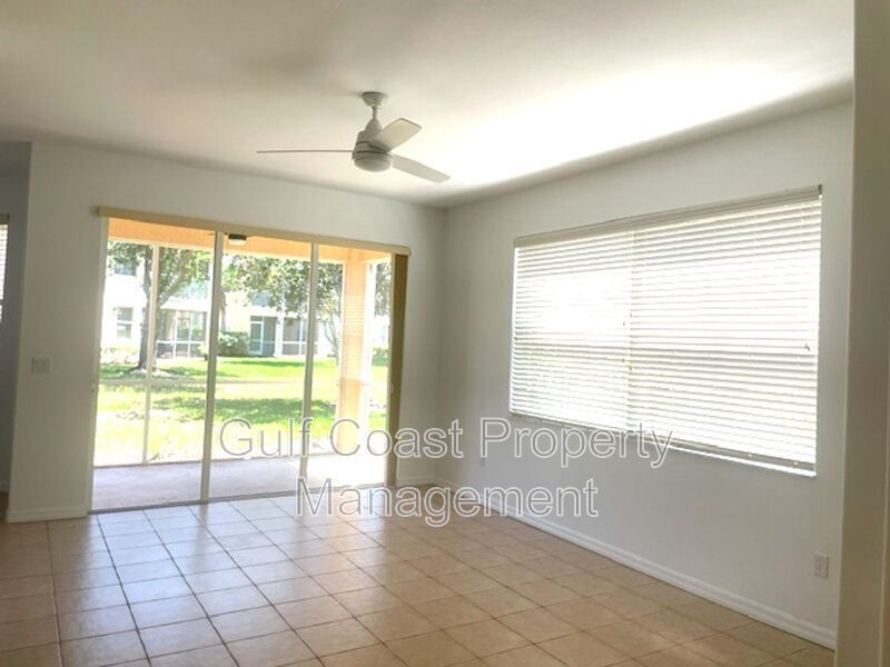 Elegant 3 Bedroom End-Unit Condo with Screened Lanai & Pond Views and A Private Garage property image