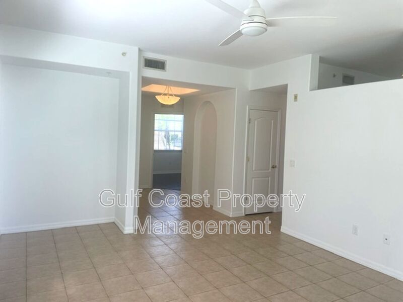 Elegant 3 Bedroom End-Unit Condo with Screened Lanai & Pond Views and A Private Garage property image