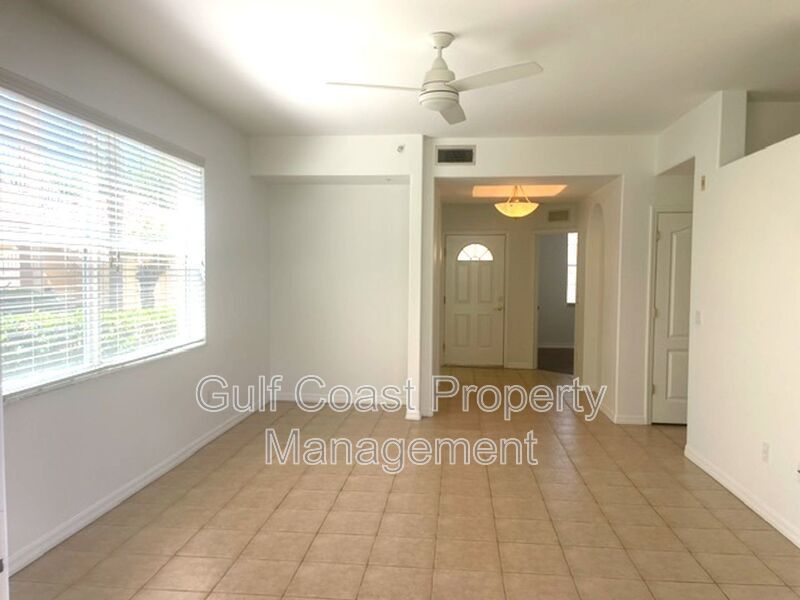 Elegant 3 Bedroom End-Unit Condo with Screened Lanai & Pond Views and A Private Garage property image