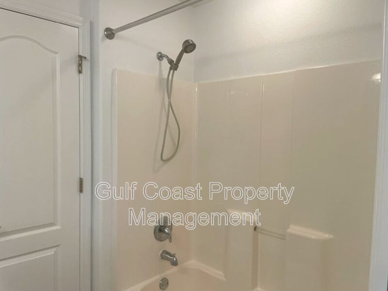 Elegant 3 Bedroom End-Unit Condo with Screened Lanai & Pond Views and A Private Garage property image