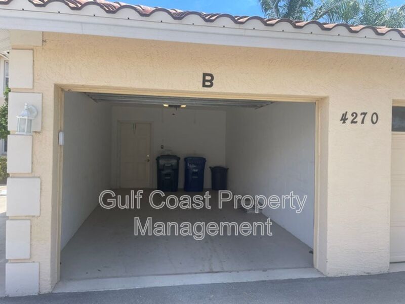 Elegant 3 Bedroom End-Unit Condo with Screened Lanai & Pond Views and A Private Garage property image
