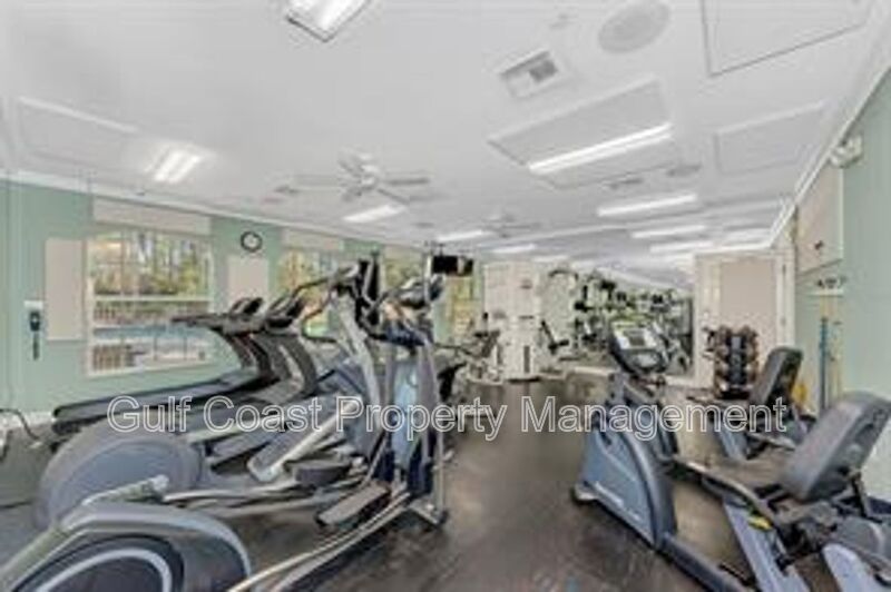 Elegant 3 Bedroom End-Unit Condo with Screened Lanai & Pond Views and A Private Garage property image