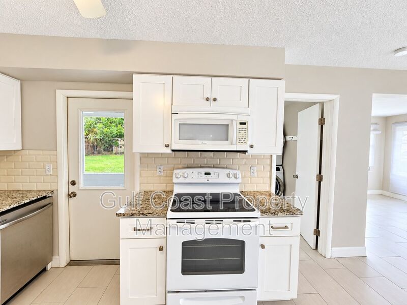 Beautifully Updated Annual Rental with 2 Bed, 2 Bath & Private Fenced Backyard Yard property image