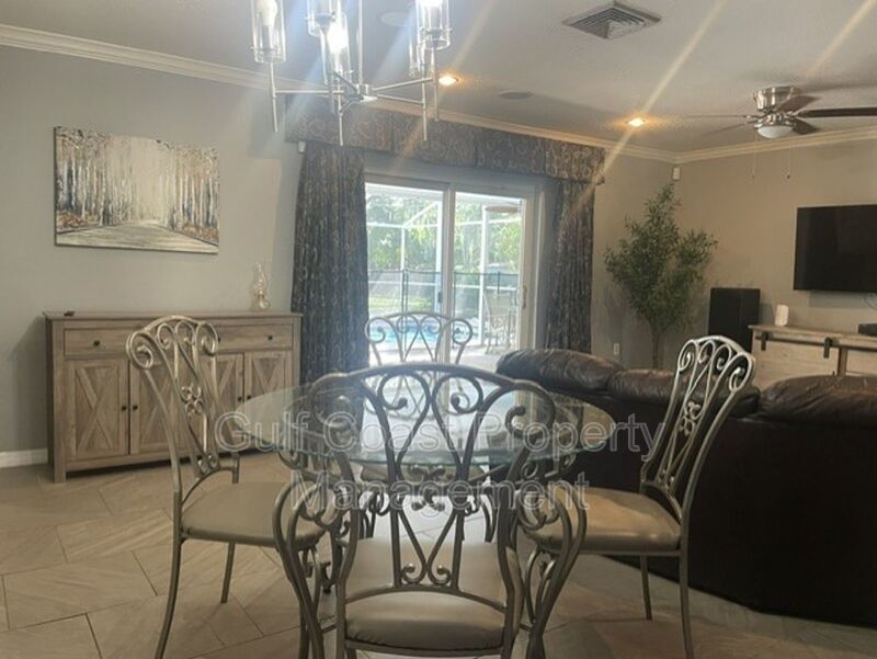 Spacious Furnished Pool Home with Oversized Yard, Mature Trees & RV/Boat Parking property image