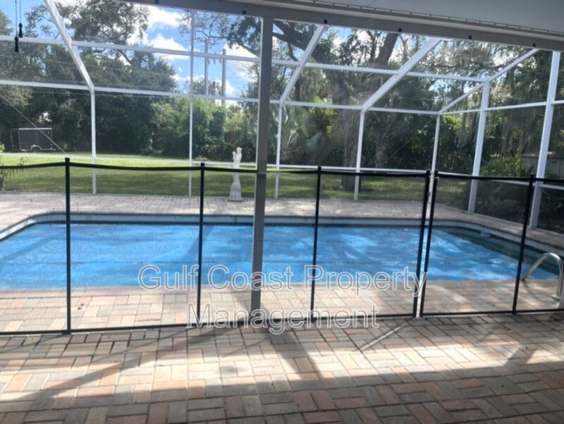 Spacious Furnished Pool Home with Oversized Yard, Mature Trees & RV/Boat Parking property image