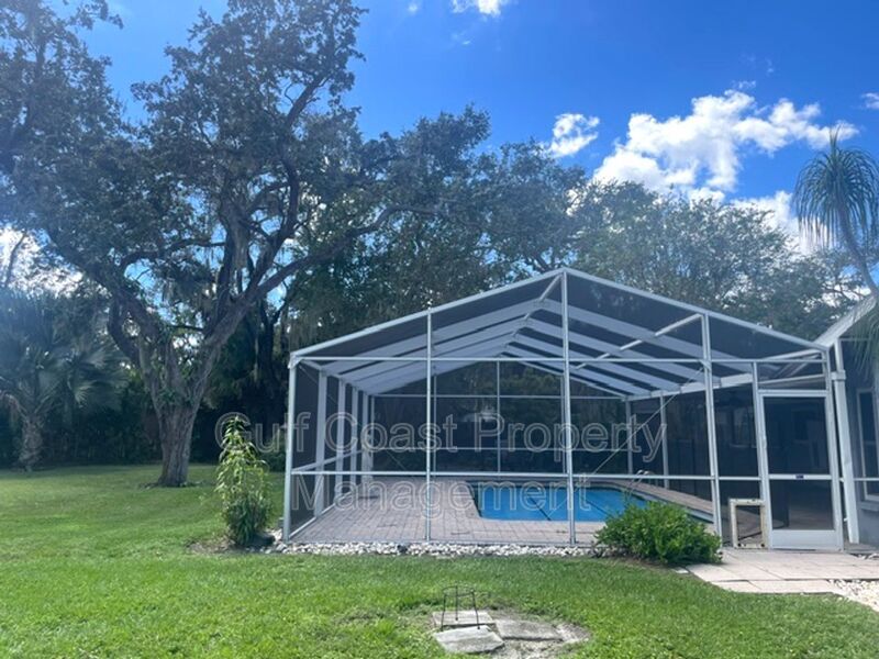 Spacious Furnished Pool Home with Oversized Yard, Mature Trees & RV/Boat Parking property image