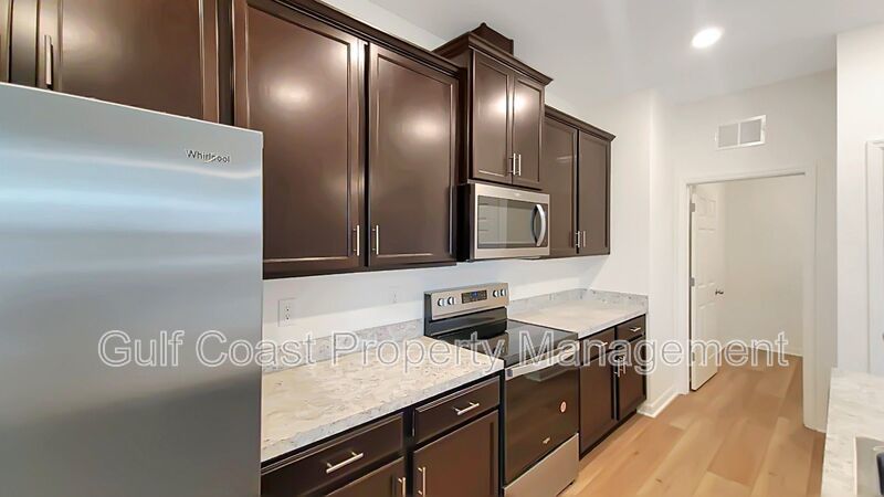 Annual Rental Home with Three Bedrooms, Two Baths, Plus an Office and a Two Car Garage Located in Heron Bay. property image