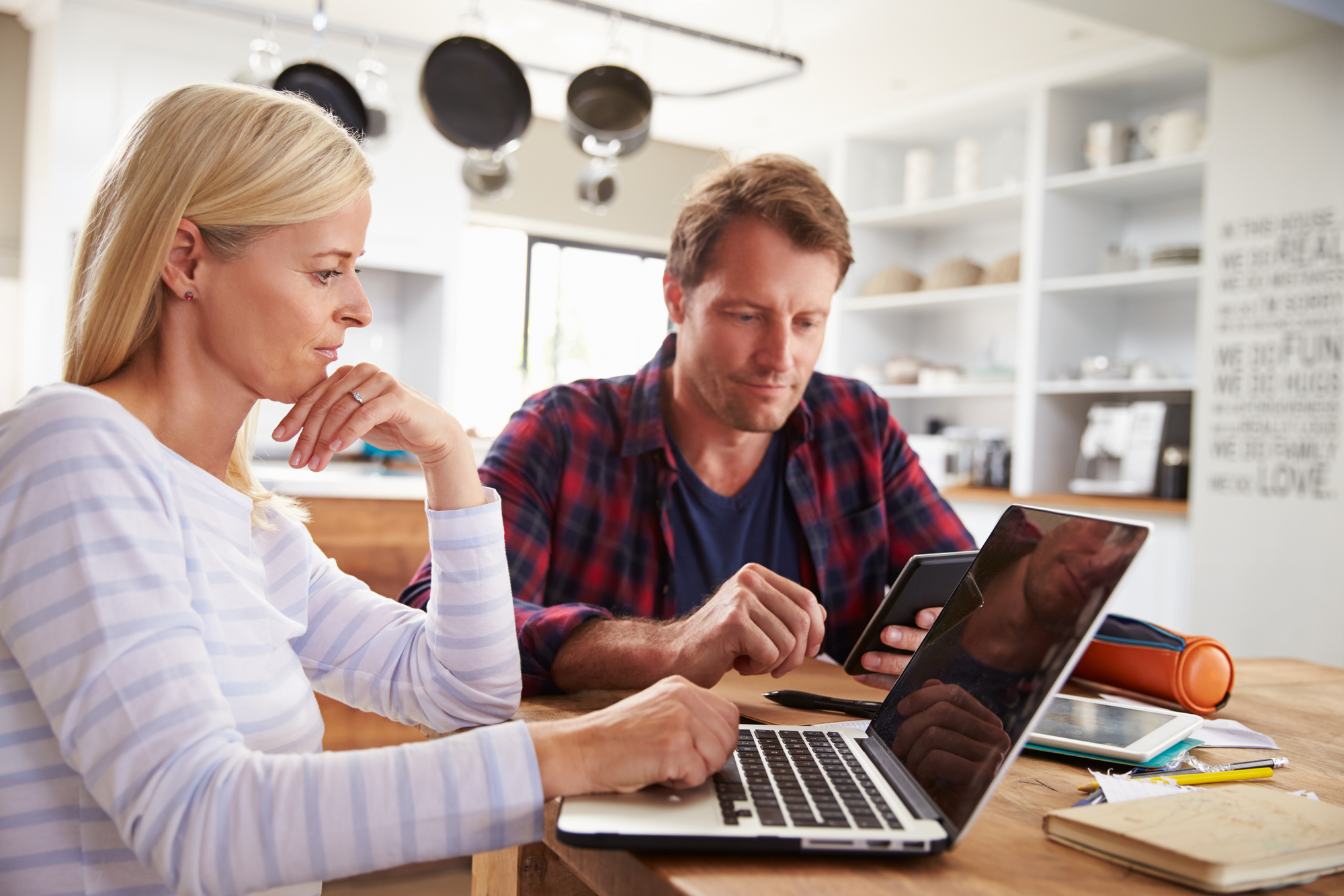 Couple using computers