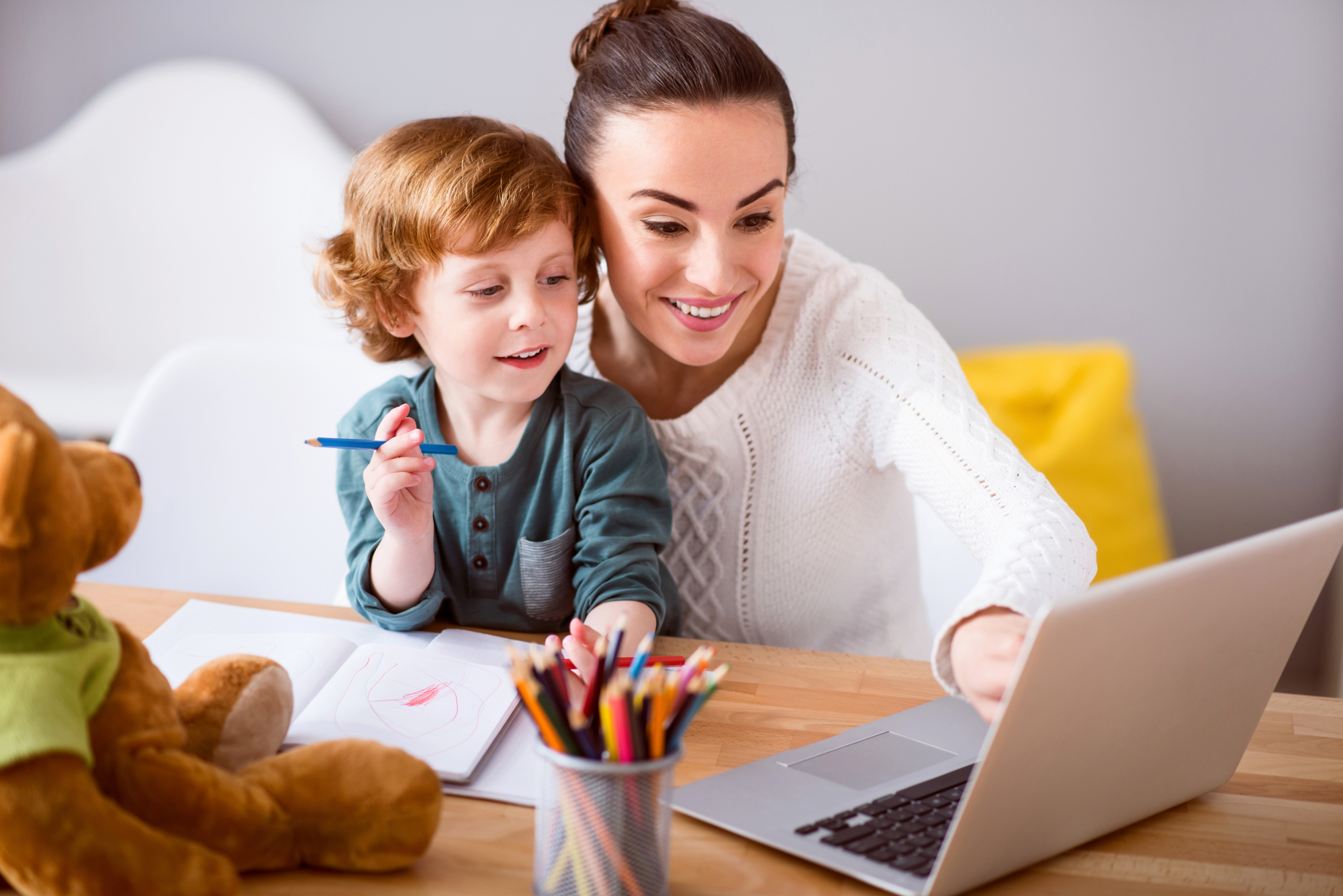 Mother and child looking at laptop