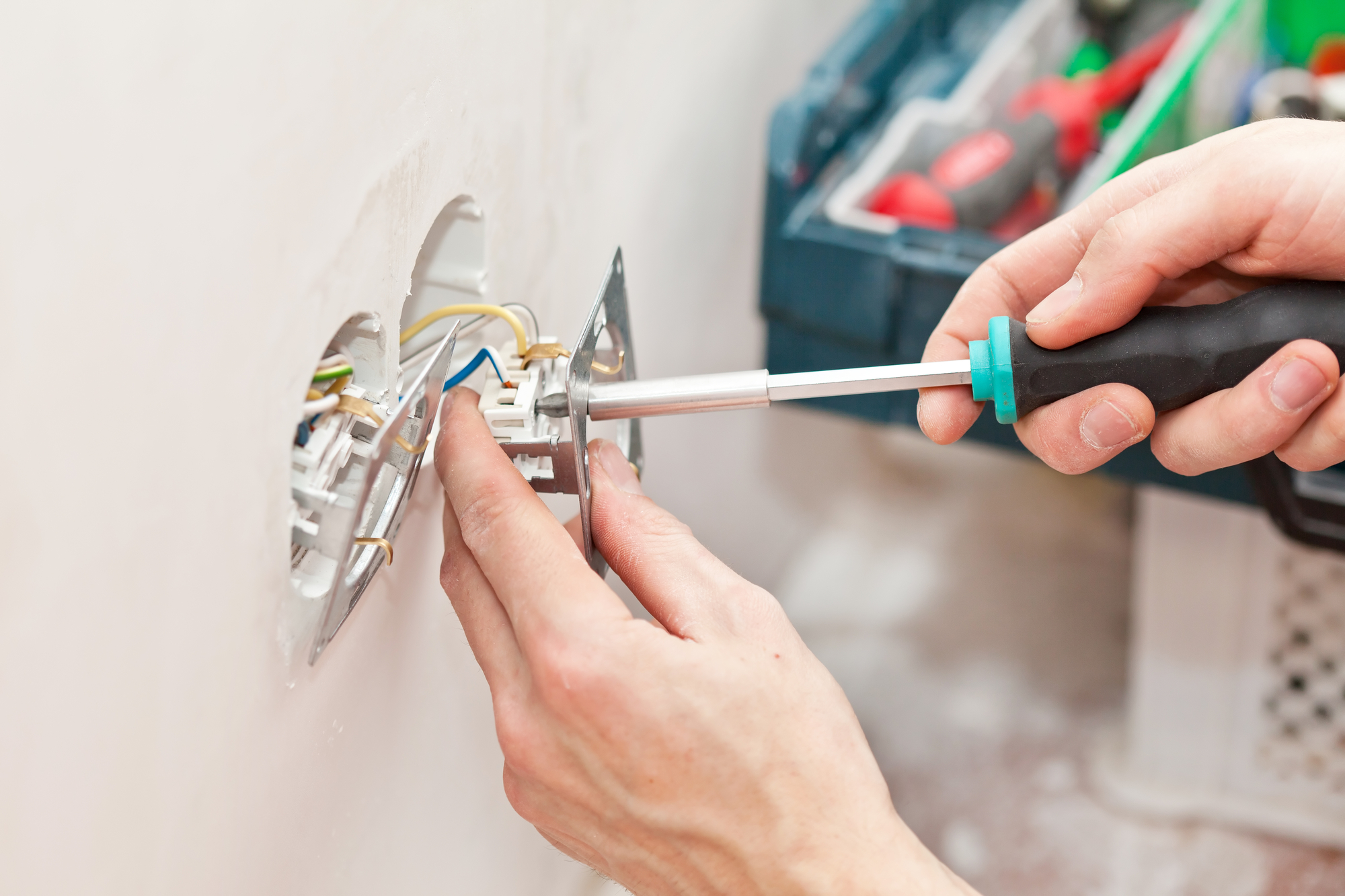 The hands of an electrician